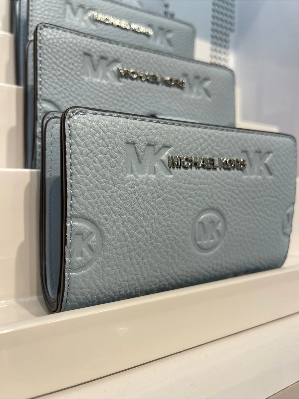 Michael Kors Jet Set Travel Med MK Logo Debossed Bifold Wallet Pale Ocean  NWT